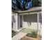 Inviting front entrance and covered porch, with the house number clearly displayed at 180 Old Connersville Rd, Bartow, FL 33830