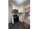 The kitchen has updated appliances and plenty of cabinet space at 180 Old Connersville Rd, Bartow, FL 33830
