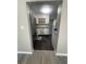 Cozy kitchen with stainless steel appliances and white cabinetry at 180 Old Connersville Rd, Bartow, FL 33830