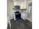 Bright kitchen features modern appliances, white cabinets, and durable countertops at 180 Old Connersville Rd, Bartow, FL 33830