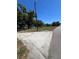 Expansive land area bordered by mature trees, presenting an opportunity for development at 180 Old Connersville Rd, Bartow, FL 33830