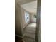 Bright living room with light gray wood flooring and a large picture window at 180 Old Connersville Rd, Bartow, FL 33830