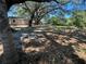 Spacious yard featuring a cozy cottage, complemented by mature trees and a serene, natural landscape at 180 Old Connersville Rd, Bartow, FL 33830