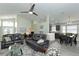 Spacious living room showcases an open floor plan, tile floors, and comfortable furnishings at 1942 Bermuda Pointe Dr, Haines City, FL 33844
