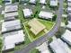 An aerial view of the manufactured home in a community with a nice lawn outlined in white at 2055 S Floral Ave # 42, Bartow, FL 33830