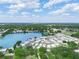 Beautiful community view with homes nestled near a scenic and tranquil lake at 2055 S Floral Ave # 42, Bartow, FL 33830