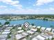 Beautiful community aerial view featuring the water, streets, and rooftops on a sunny day at 2055 S Floral Ave # 42, Bartow, FL 33830