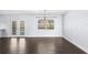 Bright dining space leading to a patio with a pool view at 2096 Lake Ariana Blvd, Auburndale, FL 33823