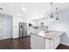 Stylish kitchen with stainless steel appliances, granite countertops, and a functional island at 2096 Lake Ariana Blvd, Auburndale, FL 33823