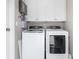 Convenient laundry room equipped with modern washer and dryer units at 2096 Lake Ariana Blvd, Auburndale, FL 33823