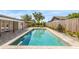 A stunning, modern pool with stone surround and meticulous landscaping at 2096 Lake Ariana Blvd, Auburndale, FL 33823