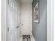 Hallway view, with a bedroom door and a closet door at 229 Elm Ct, Kissimmee, FL 34759