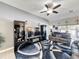 Spacious living room with modern entertainment center and comfortable seating at 229 Elm Ct, Kissimmee, FL 34759