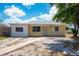Charming single-story home with a driveway at 2301 Freemason St, Lakeland, FL 33801