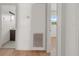 Hallway leading to the bathroom and bedroom, natural light is coming through the windows at 2301 Freemason St, Lakeland, FL 33801