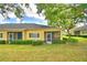 A backyard view of patio homes and lanai at 2654 Rutledge Ct, Winter Haven, FL 33884