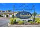 Elegant entrance to Verandahs, a deed-restricted community with well-maintained landscaping and inviting signage at 2654 Rutledge Ct, Winter Haven, FL 33884