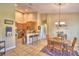 Cozy dining area adjacent to kitchen, featuring pendant lighting and comfortable seating at 2654 Rutledge Ct, Winter Haven, FL 33884