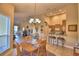 Open concept dining and living area with seamless transition, perfect for modern living at 2654 Rutledge Ct, Winter Haven, FL 33884