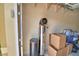 Garage features a water filtration system and storage shelves, offering functionality and organization at 2654 Rutledge Ct, Winter Haven, FL 33884