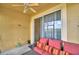 Relaxing outdoor space featuring patio furniture and a sliding glass door overlooking the green spaces beyond at 2654 Rutledge Ct, Winter Haven, FL 33884