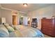 A primary bedroom featuring wood floors and a walk in closet at 2654 Rutledge Ct, Winter Haven, FL 33884