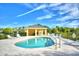 Enjoy a refreshing dip in the pristine community pool with lounge chairs and a covered pavilion at 2654 Rutledge Ct, Winter Haven, FL 33884