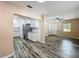 Open concept living area featuring the renovated kitchen at 320 S Elm Rd, Lakeland, FL 33801