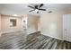Spacious living room features wood-look floors, neutral walls, and natural light at 320 S Elm Rd, Lakeland, FL 33801