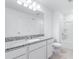 Bathroom featuring a granite countertop vanity with a shower and bathtub combination with white walls at 3265 Vesara Dr, Davenport, FL 33837