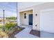 Inviting entrance with tidy landscaping and visible house number at 3265 Vesara Dr, Davenport, FL 33837