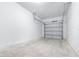 The garage has sealed concrete flooring and an automatic door system at 3265 Vesara Dr, Davenport, FL 33837