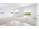 Bright living area with large windows and sliding glass door at 3265 Vesara Dr, Davenport, FL 33837