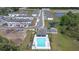 New construction neighborhood with community pool and long straight streets and retention ponds at 3269 Vesara, Davenport, FL 33837