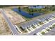 Scenic aerial view of new-construction townhomes and a pond at 3269 Vesara, Davenport, FL 33837