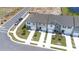 New construction townhomes feature front-entry garages, sidewalks and paved driveways at 3269 Vesara, Davenport, FL 33837