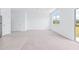 Bright and airy living space with slider glass doors and a view at 3269 Vesara, Davenport, FL 33837