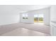 Open living area featuring large windows, a slider door, and natural light at 3269 Vesara, Davenport, FL 33837
