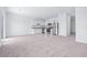 Open-concept living space featuring a kitchen with stainless steel appliances at 3269 Vesara, Davenport, FL 33837
