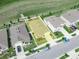 Aerial view showcasing a single-Gathering home with a well-manicured lawn, surrounded by mature trees and lush greenery at 3862 Whitney Way, Haines City, FL 33844