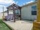 Backyard with a patio, pergola, and string lights at 3862 Whitney Way, Haines City, FL 33844