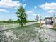 Spacious backyard with a wooden pergola, ideal for outdoor relaxation and entertaining friends and Gathering at 3862 Whitney Way, Haines City, FL 33844