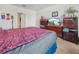 Cozy bedroom featuring comfortable furnishings, soft lighting, and ample storage space with multiple dressers at 3862 Whitney Way, Haines City, FL 33844