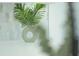 A decorative plant sits on the stone countertop with an attractive backsplash at 409 Greenfield Rd, Winter Haven, FL 33884