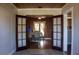 Elegant dining room featuring warm wood accents and a stylish table setting, perfect for hosting intimate gatherings at 420 N 5Th St, Lake Wales, FL 33853