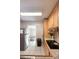 Functional kitchen featuring ample cabinet space and modern appliances, perfect for preparing meals with ease at 420 N 5Th St, Lake Wales, FL 33853