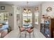 Eat-in kitchen area boasts lots of natural light with a glass table, cabinet, and views at 4279 Ashton Club Dr, Lake Wales, FL 33859