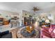 Open-concept living room with a view of the kitchen and dining room at 4279 Ashton Club Dr, Lake Wales, FL 33859