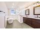 Beautiful bathroom featuring double sink vanity, soaking tub, and a separate glass shower at 508 Starr Ridge Dr, Lake Wales, FL 33898