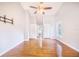 Bright and airy bedroom featuring hardwood floors and a ceiling fan at 508 Starr Ridge Dr, Lake Wales, FL 33898